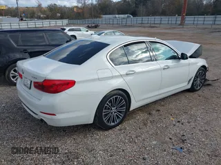 2018 BMW 5 Series 530i with VIN WBAJA5C5XJWA56855, listed as a IAAI auction lot 41128814 with Not Provided miles and . Bid and sale history available at DreamBid. Image 4.