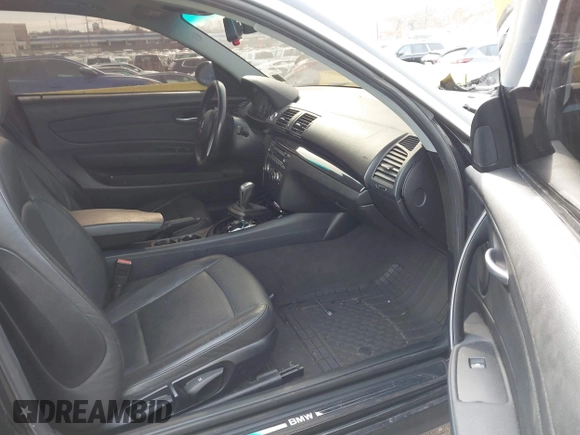 2008 BMW 1 Series 128i with VIN WBAUP93548VF48025, listed as a IAAI auction lot 41003684 with 140,344 mi miles and . Bid and sale history available at DreamBid. Image 5.