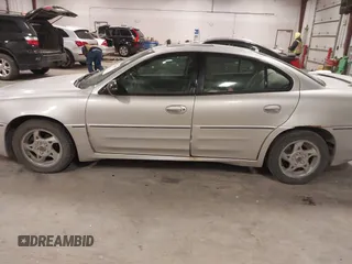 2003 Pontiac Grand Am GT with VIN 1G2NW52E93M605453, listed as a IAAI auction lot 41546839 with 202,918 mi miles. Bid and sale history available at carsss.com. Image 14.