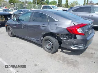2017 Honda Civic LX with VIN 2HGFC2F52HH566363, listed as a IAAI auction lot 41934807 with 94,063 mi miles and . Bid and sale history available at DreamBid. Image 3.