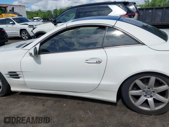 2003 Mercedes-Benz SL 500 z VIN WDBSK75F73F045221, wystawiony jako IAAI lot #42250517 z przebiegiem 103 803 mil mil oraz . Historia ofert i sprzedaży dostępna na DreamBid. Obrazek 14.