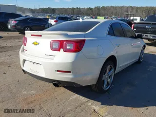 2014 Chevrolet Malibu LTZ with VIN 1G11J5SX7EF204252, listed as a IAAI auction lot 41439734 with 193,123 mi miles. Bid and sale history available at carsss.com. Image 4.
