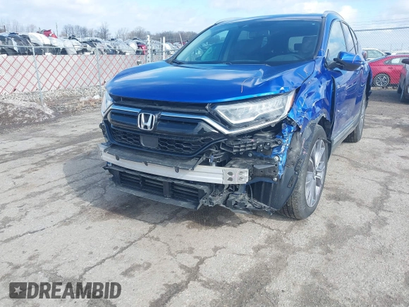 2020 Honda CR-V Touring with VIN 7FARW2H91LE012284, listed as a IAAI auction lot 41672460 with 28,207 mi miles and . Bid and sale history available at DreamBid. Image 6.