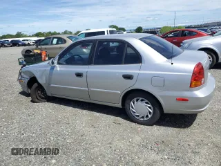 2005 Hyundai Accent GLS with VIN KMHCG45C65U576674, listed as a Copart auction lot 50726074 with 118,532 mi miles and Non Repairable. Bid and sale history available at carsss.com. Image 2.