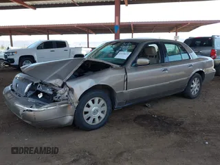 2003 Mercury Grand Marquis LS Premium with VIN 2MEFM75W23X613004, listed as a IAAI auction lot 41974625 with 151,023 mi miles and . Bid and sale history available at DreamBid. Image 2.