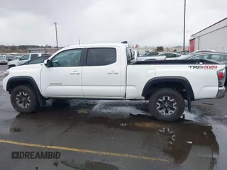 2021 Toyota Tacoma 4WD SR5 with VIN 3TMDZ5BN6MM108851, listed as a IAAI auction lot 41513057 with 25,261 mi miles. Bid and sale history available at carsss.com. Image 14.