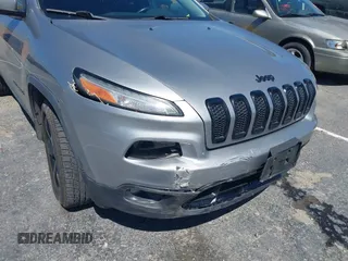 2016 Jeep Cherokee Latitude with VIN 1C4PJMCS4GW170322, listed as a IAAI auction lot 41841572 with 112,884 mi miles and . Bid and sale history available at carsss.com. Image 6.
