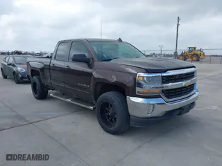 2016 Chevrolet Silverado 1500 LT with VIN 1GCRCREC8GZ180162, listed as a IAAI auction lot 41946432 with 162,090 mi miles. Bid and sale history available at carsss.com. Image 1.