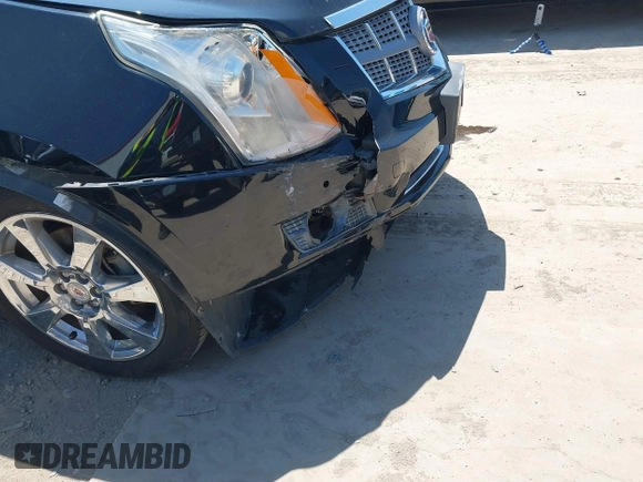 2011 Cadillac SRX Premium Collection z VIN 3GYFNCEY5BS597566, wystawiony jako IAAI lot #41983784 z przebiegiem 102 989 mil mil oraz . Historia ofert i sprzedaży dostępna na DreamBid. Obrazek 14.