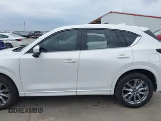 2025 Mazda CX-5 2.5 S Premium Plus Package with VIN JM3KFBEM9S0549107, listed as a IAAI auction lot 41695549 with 3,544 mi miles. Bid and sale history available at carsss.com. Image 14.