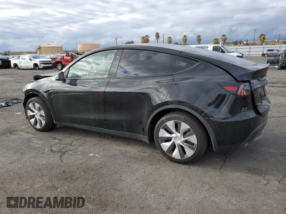 2023 Tesla Model Y Long Range with VIN 7SAYGDEE8PF877926, listed as a Copart auction lot 44342645 with 41,408 mi miles and Salvage Title. Bid and sale history available at DreamBid. Image 2.