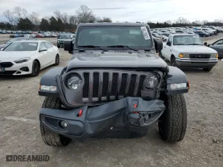 2019 Jeep Wrangler Unlimited Rubicon with VIN 1C4HJXFN0KW545613, listed as a Copart auction lot 42807785 with 64,510 mi miles and Salvage Title. Bid and sale history available at carsss.com. Image 5.