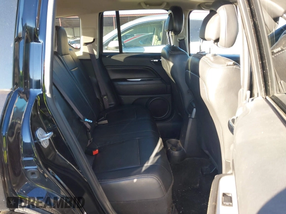 2016 Jeep Compass High Altitude Edition with VIN 1C4NJDEB0GD730420, listed as a IAAI auction lot 40889347 with 115,261 mi miles. Bid and sale history available at carsss.com. Image 8.