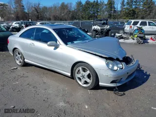 2003 Mercedes-Benz CLK-Class 5.0L with VIN WDBTJ75J03F059702, listed as a IAAI auction lot 41687017 with 185,854 mi miles. Bid and sale history available at carsss.com. Image 1.