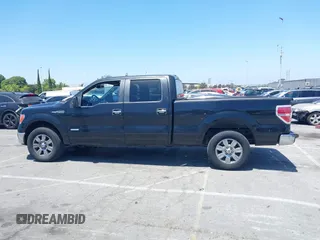 2012 Ford F-150 XL z VIN 1FTFW1CT5CFB34590, wystawiony jako IAAI lot #42279514 z przebiegiem 196 480 mil mil oraz . Historia ofert i sprzedaży dostępna na DreamBid. Obrazek 14.