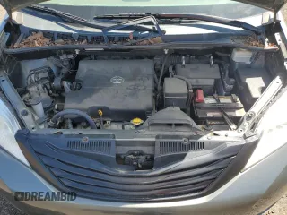 2012 Toyota Sienna with VIN 5TDZK3DC8CS198495, listed as a Copart auction lot 57335205 with 66,786 mi miles and Salvage title. Bid and sale history available at DreamBid. Image 12.