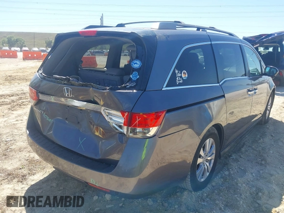 2015 Honda Odyssey EX-L with VIN 5FNRL5H61FB048170, listed as a IAAI auction lot 41822798 with 179,550 mi miles and . Bid and sale history available at DreamBid. Image 4.