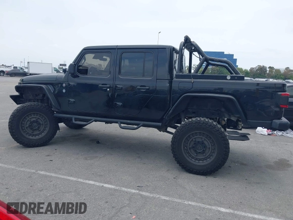 2020 Jeep Gladiator Rubicon z VIN 1C6JJTBG7LL102189, wystawiony jako IAAI lot #42320968 z przebiegiem 68 266 mil mil oraz . Historia ofert i sprzedaży dostępna na DreamBid. Obrazek 14.