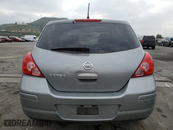 2007 Nissan Versa 1.8 S with VIN 3N1BC13E47L357890, listed as a Copart auction lot 50327045 with 188,445 mi miles and Salvage Title. Bid and sale history available at carsss.com. Image 6.