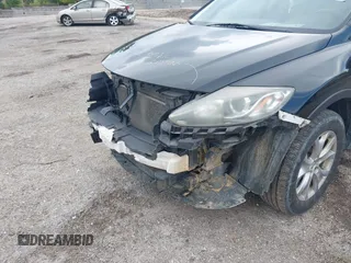 2015 Mazda CX-9 Touring with VIN JM3TB2CA4F0465730, listed as a IAAI auction lot 42512203 with 179,805 mi miles and . Bid and sale history available at DreamBid. Image 19.