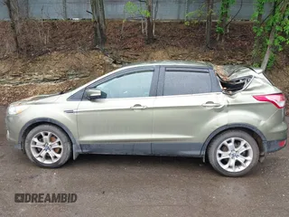 2013 Ford Escape SEL с VIN 1FMCU9HX2DUB52251, выставлен на аукционе IAAI как лот 42253659 с пробегом Не указан миль и . История ставок и продаж доступна на DreamBid. Изображение 14.