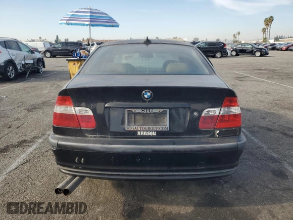 2002 BMW 3 Series 330i with VIN WBAEV53452KM00658, listed as a Copart auction lot 82062874 with 106,031 mi miles and Salvage Title. Bid and sale history available at carsss.com. Image 6.