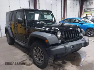 2018 Jeep Wrangler Unlimited Rubicon Recon z VIN 1C4BJWFG6JL811783, wystawiony jako IAAI lot #42087417 z przebiegiem 81 413 mil mil oraz . Historia ofert i sprzedaży dostępna na DreamBid. Obrazek 1.