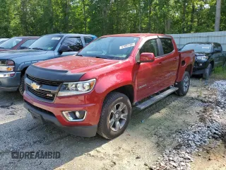 2020 Chevrolet Colorado 4WD Z71 z VIN 1GCGTDENXL1111901, wystawiony jako Copart lot #57093195 z przebiegiem 60 992 mil mil oraz Szkoda całkowita • Salvage title. Historia ofert i sprzedaży dostępna na DreamBid. Obrazek 1.