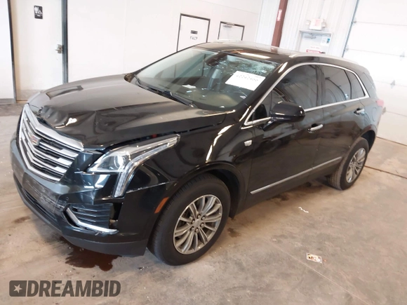 2019 Cadillac XT5 Luxury FWD z VIN 1GYKNCRS2KZ197052, wystawiony jako IAAI lot #42242466 z przebiegiem 86 678 mil mil oraz . Historia ofert i sprzedaży dostępna na DreamBid. Obrazek 17.