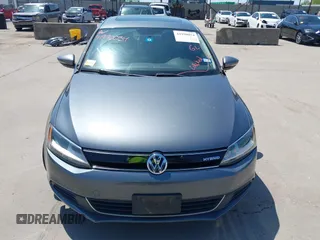 2013 Volkswagen Jetta Sedan Hybrid SE with VIN 3VW637AJ9DM228757, listed as a IAAI auction lot 41990054 with 176,365 mi miles. Bid and sale history available at carsss.com. Image 12.