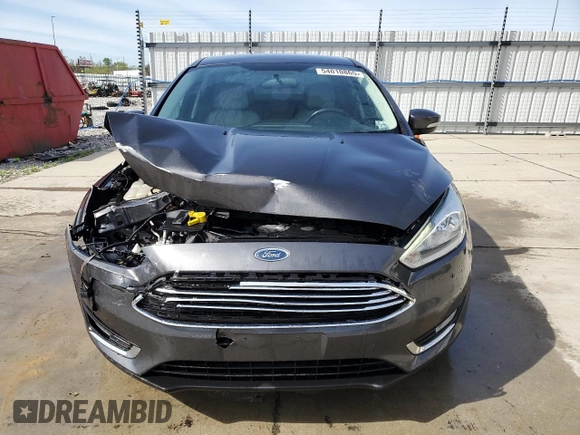 2015 Ford Focus Titanium с VIN 1FADP3J2XFL200668, выставлен на аукционе Copart как лот 54010865 с пробегом 138 459 миль миль и Списание • Salvage title. История ставок и продаж доступна на DreamBid. Изображение 5.