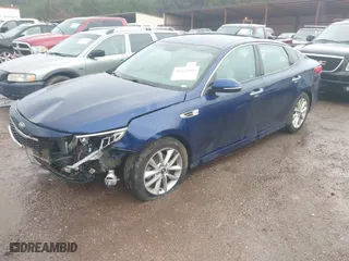 2017 Kia Optima LX with VIN 5XXGT4L37HG125705, listed as a IAAI auction lot 41542959 with 106,819 mi miles. Bid and sale history available at carsss.com. Image 2.