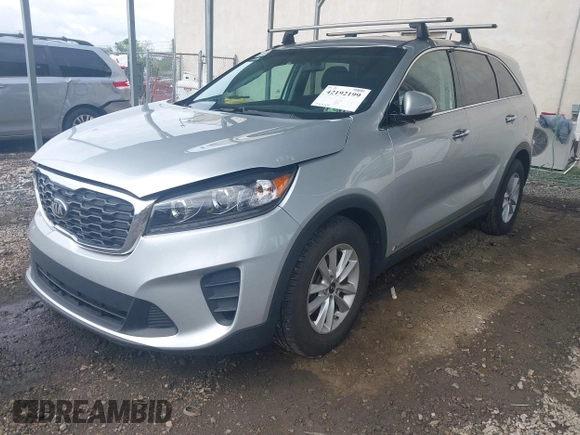 2019 Kia Sorento LX z VIN 5XYPGDA58KG482726, wystawiony jako IAAI lot #42192199 z przebiegiem 79 545 mil mil oraz . Historia ofert i sprzedaży dostępna na DreamBid. Obrazek 2.