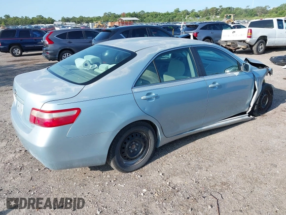 2007 Toyota Camry CE z VIN 4T1BE46K97U714024, wystawiony jako IAAI lot #42416410 z przebiegiem 218 500 mil mil oraz . Historia ofert i sprzedaży dostępna na DreamBid. Obrazek 4.