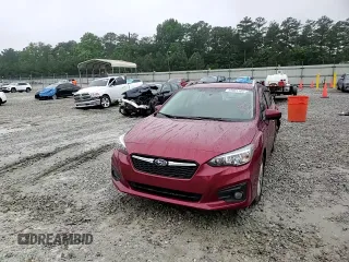 2018 Subaru Impreza Premium z VIN 4S3GTAD62J3709314, wystawiony jako Copart lot #59881165 z przebiegiem 56 482 mil mil oraz Szkoda całkowita • Salvage title. Historia ofert i sprzedaży dostępna na DreamBid. Obrazek 13.