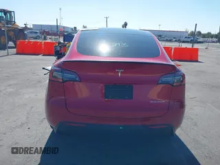 2021 Tesla Model Y Performance with VIN 5YJYGDEF4MF092062, listed as a IAAI auction lot 41583793 with 57,194 mi miles and . Bid and sale history available at DreamBid. Image 16.