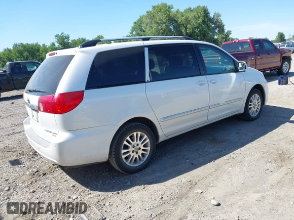 2008 Toyota Sienna XLE with VIN 5TDBK22CX8S013241, listed as a IAAI auction lot 42609126 with 201,919 mi miles and . Bid and sale history available at DreamBid. Image 4.