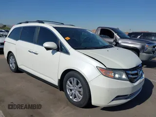 2016 Honda Odyssey EX-L with VIN 5FNRL5H67GB128929, listed as a IAAI auction lot 42126878 with 157,836 mi miles. Bid and sale history available at carsss.com. Image 1.