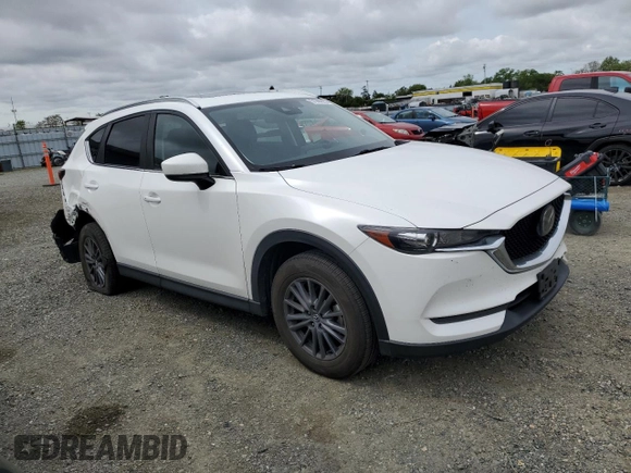 2020 Mazda CX-5 Touring with VIN JM3KFACM0L0857278, listed as a Copart auction lot 51980825 with 73,411 mi miles and Salvage Title. Bid and sale history available at carsss.com. Image 4.