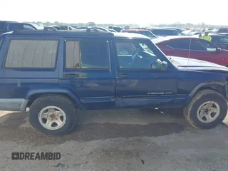 2001 Jeep Cherokee Sport with VIN 1J4FT48S01L522281, listed as a IAAI auction lot 41999570 with 261,698 mi miles and . Bid and sale history available at DreamBid. Image 13.
