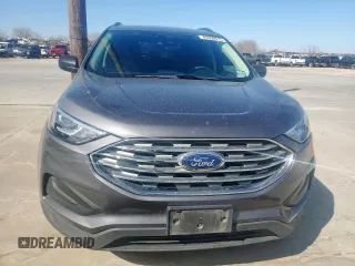 2021 Ford Edge SE z VIN 2FMPK3G94MBA46090, wystawiony jako Copart lot #49350915 z przebiegiem 99 324 mil mil oraz Czysty tytuł • Clean title. Historia ofert i sprzedaży dostępna na DreamBid. Obrazek 5.
