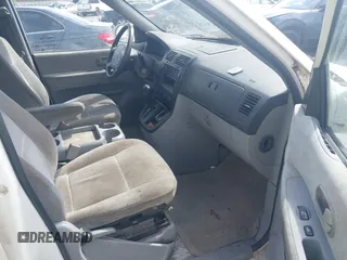 2005 Kia Sedona LX with VIN KNDUP132856700868, listed as a IAAI auction lot 41661428 with 229,142 mi miles. Bid and sale history available at carsss.com. Image 5.