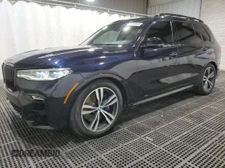 2020 BMW X7 M50i z VIN 5UXCX6C02LLE35890, wystawiony jako Copart lot #55766555 z przebiegiem 71 111 mil mil oraz Czysty tytuł • Clean title. Historia ofert i sprzedaży dostępna na DreamBid. Obrazek 1.