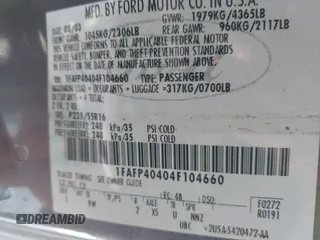 2004 Ford Mustang Standard with VIN 1FAFP40404F104660, listed as a IAAI auction lot 41602400 with 165,992 mi miles. Bid and sale history available at carsss.com. Image 9.