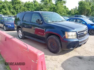 2007 Chevrolet Tahoe LT z VIN 1GNFC13J97J100573, wystawiony jako IAAI lot #42450311 z przebiegiem 234 099 mil mil oraz . Historia ofert i sprzedaży dostępna na DreamBid. Obrazek 1.
