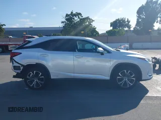 2021 Lexus RX 450h with VIN 2T2HGMDA2MC071281, listed as a IAAI auction lot 42587770 with 88,009 mi miles and . Bid and sale history available at DreamBid. Image 13.