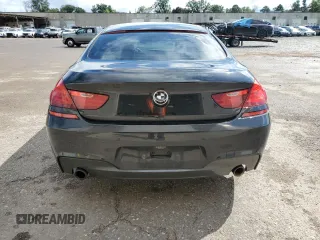 2017 BMW 6 Series z VIN WBA6D2C31HGT73273, wystawiony jako Copart lot #67705734 z przebiegiem 75 080 mil mil oraz Szkoda całkowita • Salvage title. Historia ofert i sprzedaży dostępna na DreamBid. Obrazek 6.