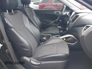 2013 Hyundai Veloster w/Black Int with VIN KMHTC6AD7DU170049, listed as a IAAI auction lot 42441737 with 101,924 mi miles and . Bid and sale history available at DreamBid. Image 5.