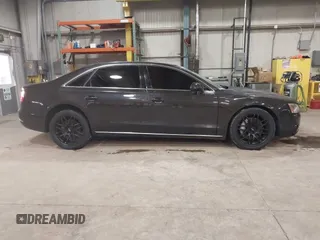 2012 Audi A8 z VIN WAURVAFD6CN014546, wystawiony jako IAAI lot #41357932 z przebiegiem 93 516 mil mil oraz . Historia ofert i sprzedaży dostępna na DreamBid. Obrazek 13.