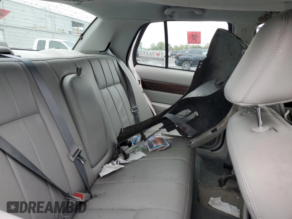 2003 Mercury Grand Marquis LS Premium with VIN 2MEFM75W13X667779, listed as a Copart auction lot 52869985 with 127,506 mi miles and Salvage Title. Bid and sale history available at DreamBid. Image 10.